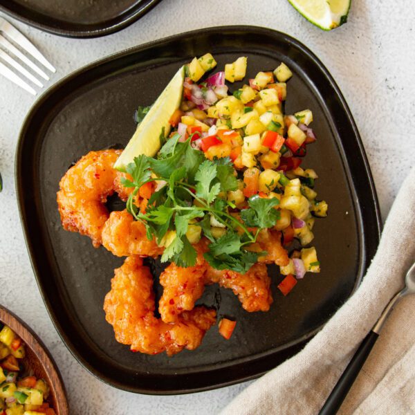 Pineapple Pico De Gallo with shrimp on a plate